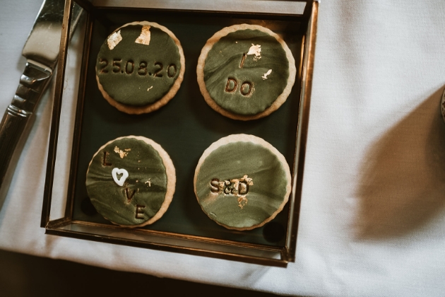 iced green and gold wedding date cookies