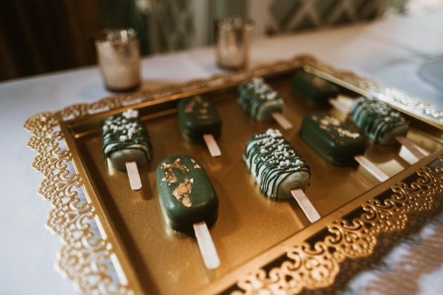 wedding lollies iced in green and gold