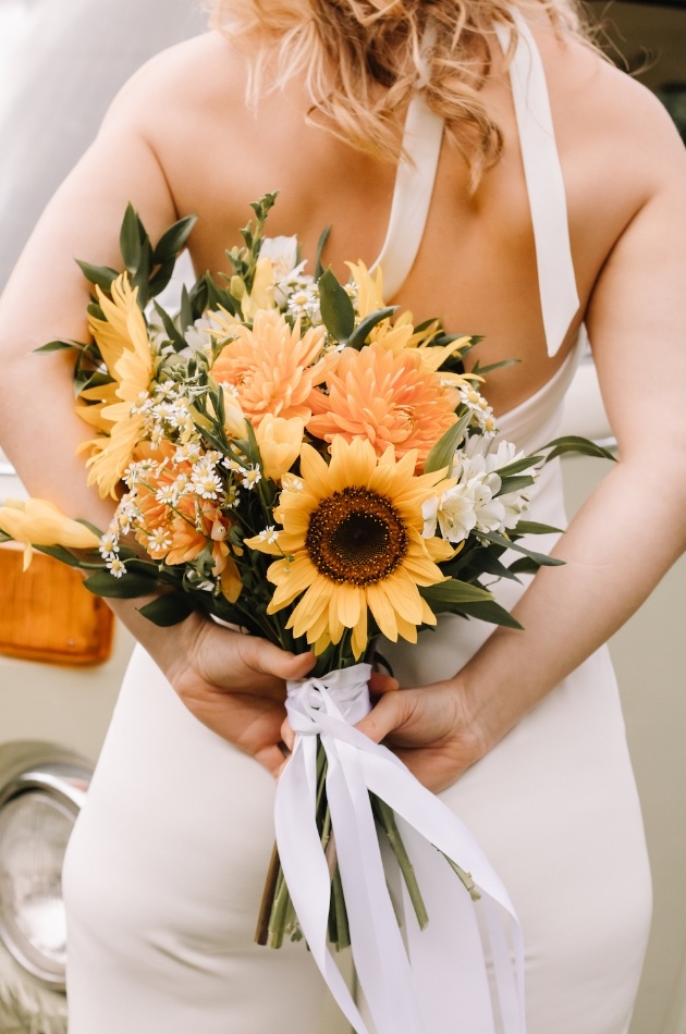Sunflower bridal bouquet with yellow and orange blooms