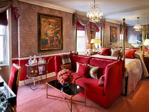 traditional suite with red furnishings