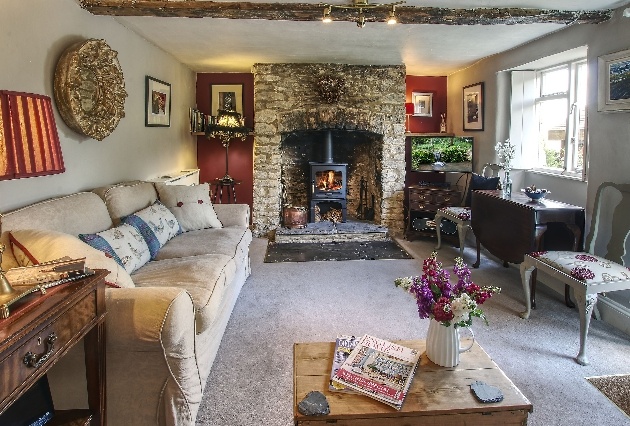 lounge of cottage vintage in style with wood burner