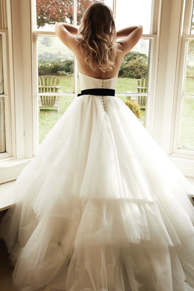layered ball gown with black belt and buttoned back 