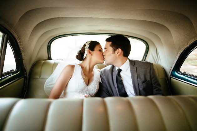 wedding couple inside car