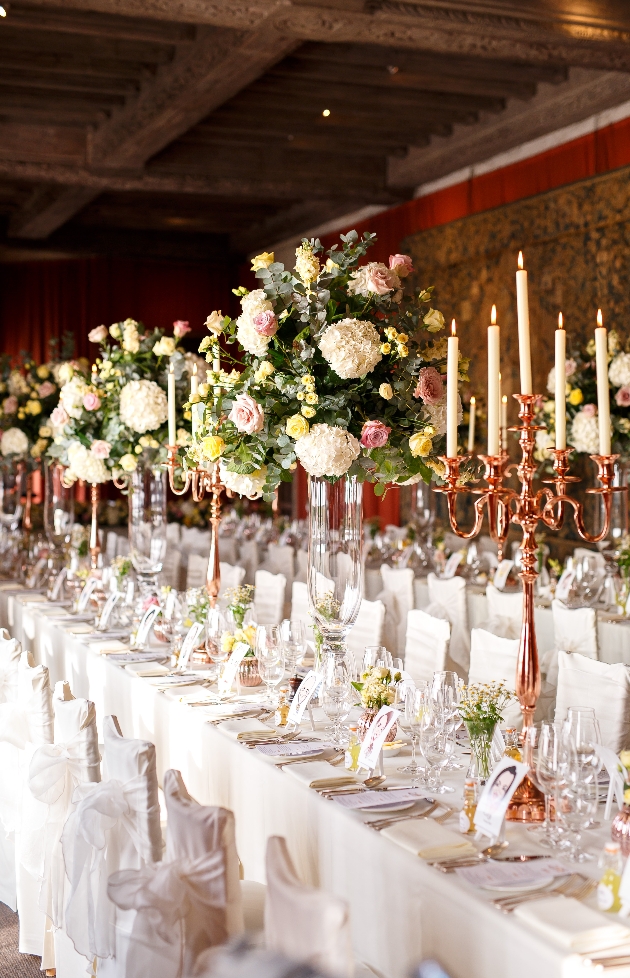 Wedding reception at Leeds Castle with white and pink florals by Louise Roots