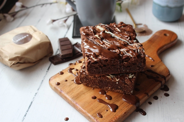 huge brownies on a chopping bord