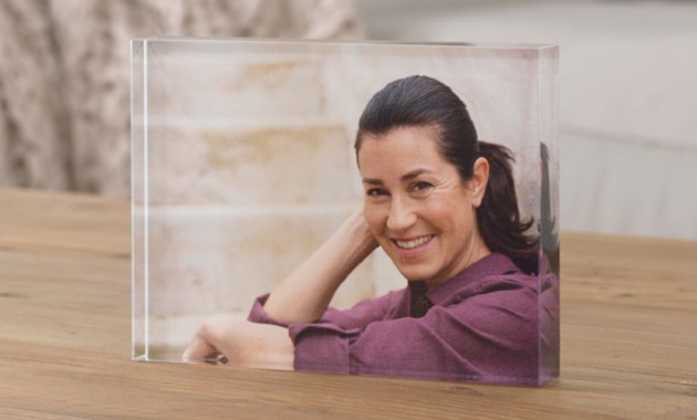 clear perspex block with a photo of a woman in it