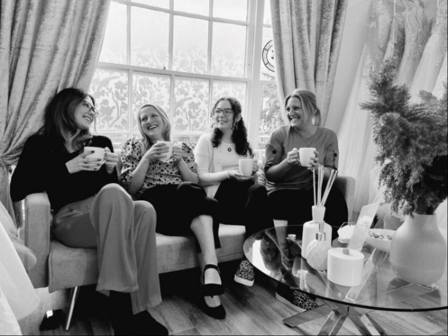 Ladies enjoying a cup of tea and a chat at Victoria Grace Bridal 