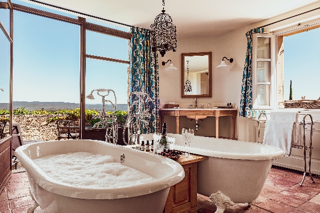 Two bathtubs overlooking the Provence countryside