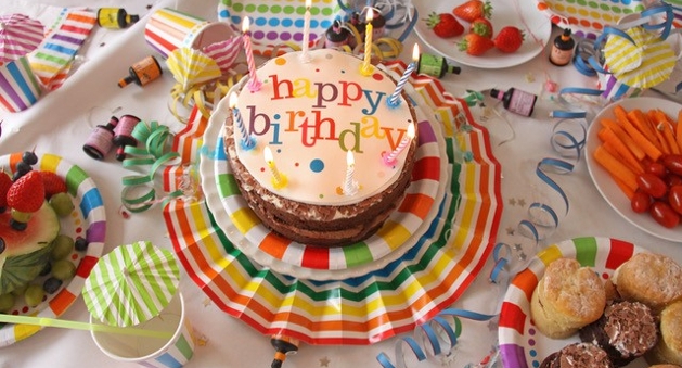 colourful birthday cake on a buffet table 