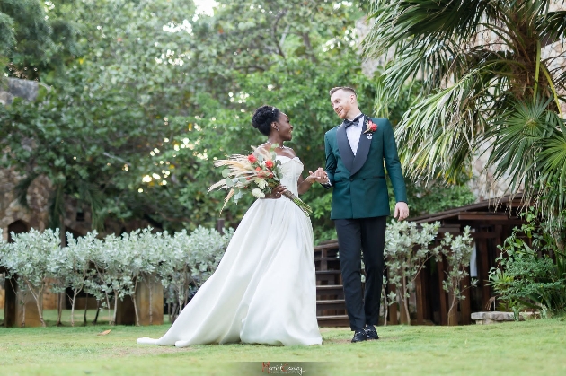 Pictured is groom Rowan Adams and his wife Claudine who wed at Pattoo Castle in Negril, Jamaica