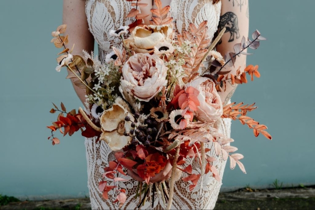 stunning bouquet of artificial flowers in autumnal hues