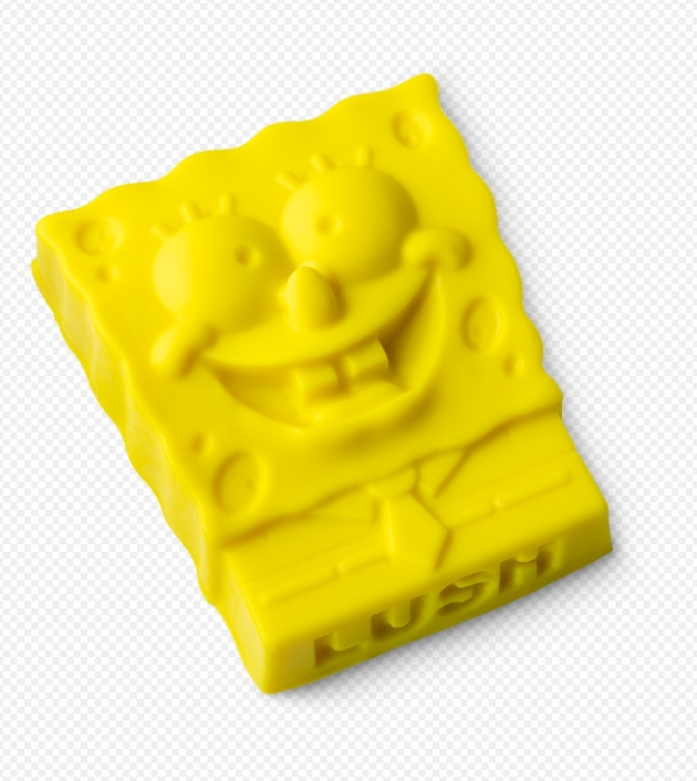 Yellow soap bar in shape of cartoon character. 