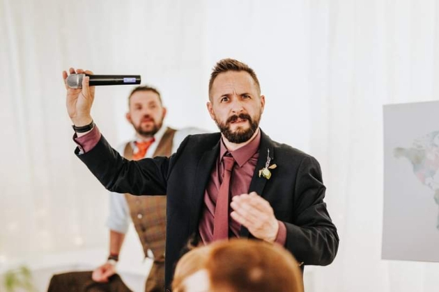 Someone looking frustrated while making a wedding speech