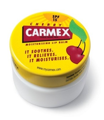 Yellow Carmex container on a white background. 