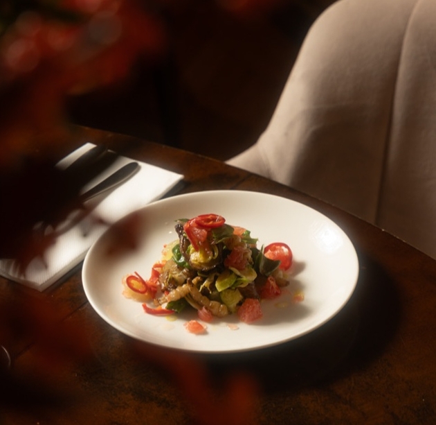 lots of veg cooked piled on a plate