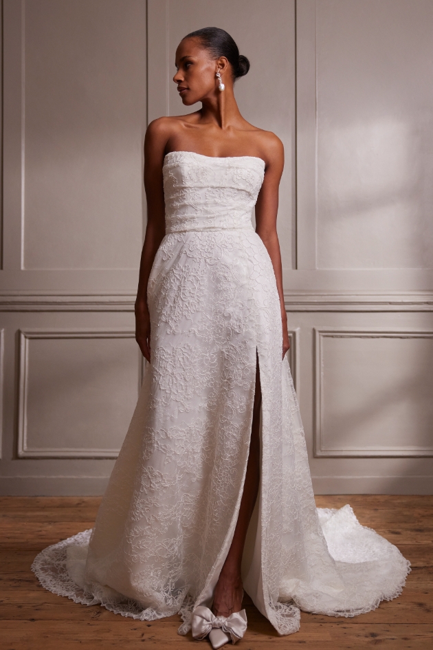 woman posing in textured white dress