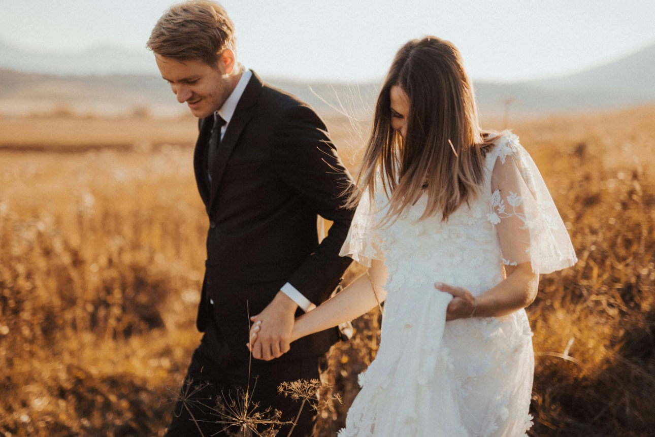 couple wed in field